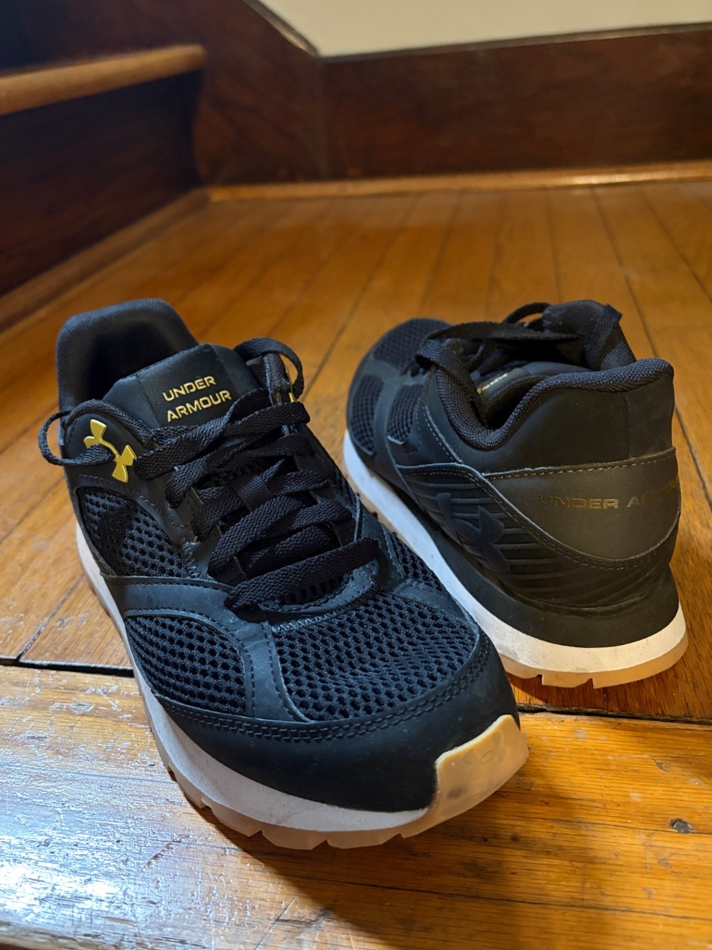 Under Armour Black Athletic Shoes with Gold Logo Accents